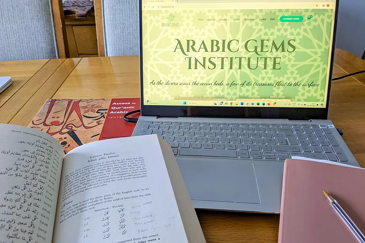 Computer and books to aid study of The Quran