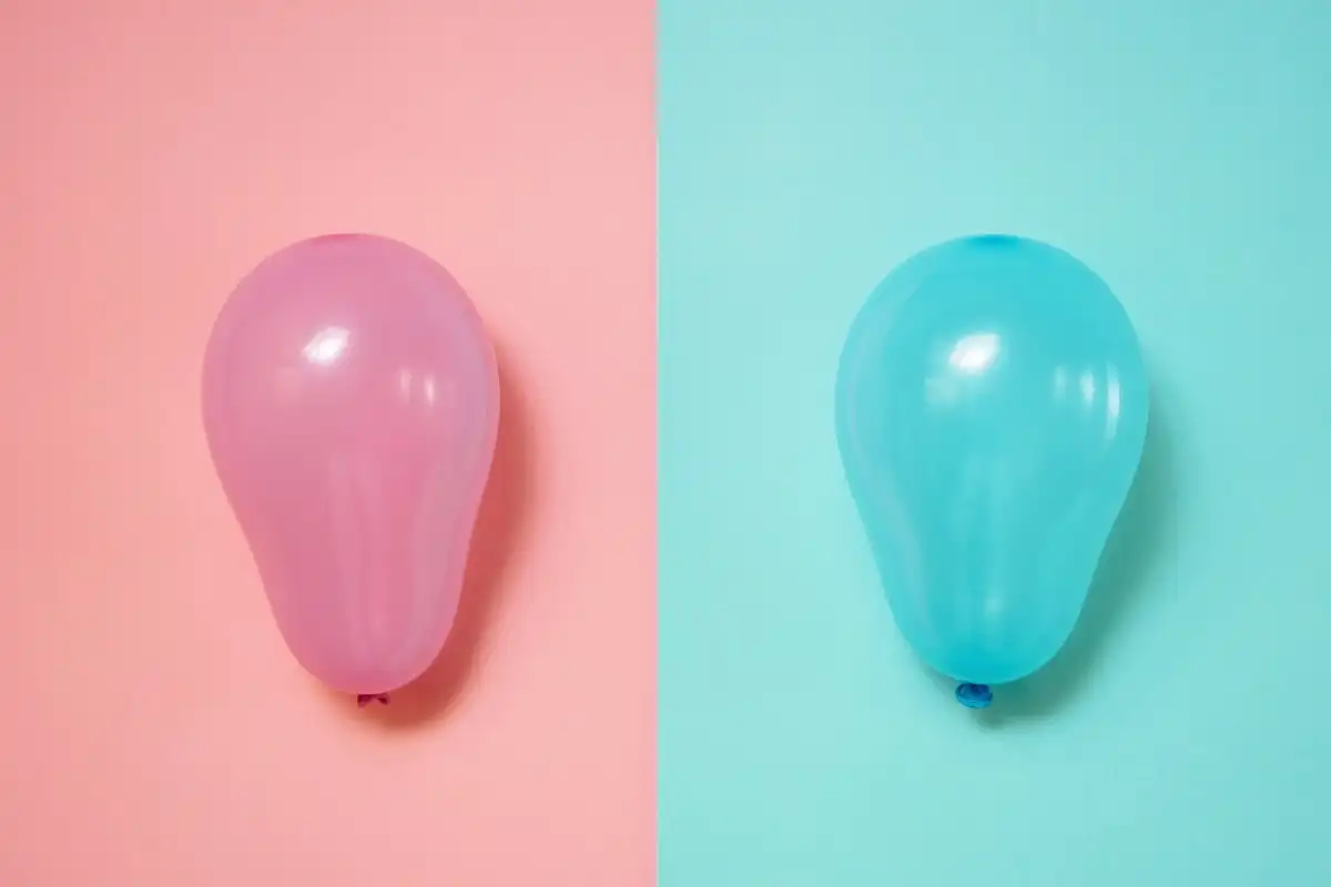 Two balloons side by side, one blue and one pink - Happy Mind Training Blog | Language Can Shape Our Reality