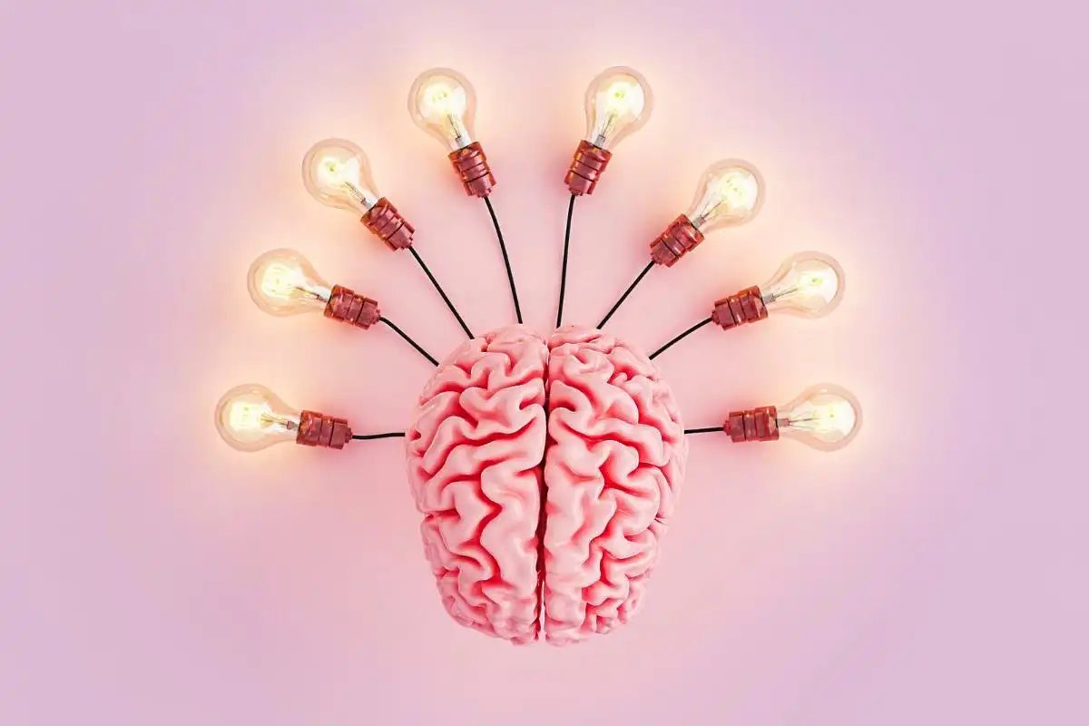 Brain connected to multiple lightbulbs -Happy Mind Training Blog | Compliments Make Us Feel Good